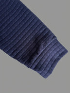 Izajasz – Teksturowana koszulka polo z kieszenią na rękawie